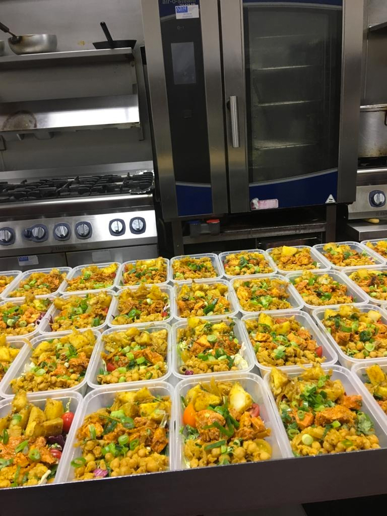 Boxes full of beautifully prepared Bangladeshi food